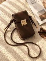 Women's lock closure passport crossbody bag with adjustable strap available in four colors