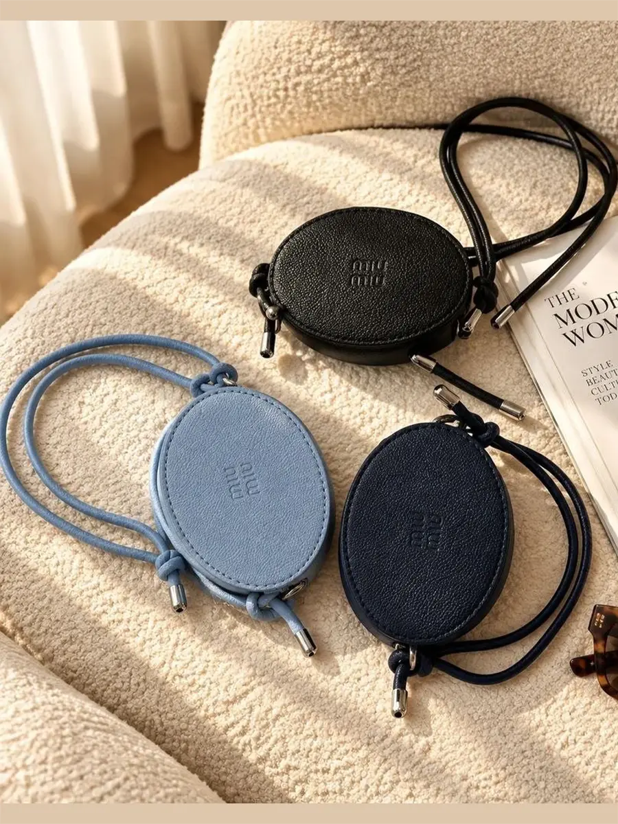 3 Women's Miu Miu mini bag with adjustable strap available in black, navy blue, and blue