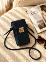 Women's lock closure passport crossbody bag with adjustable strap available in four colors