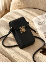 Women's lock closure passport crossbody bag with adjustable strap available in four colors